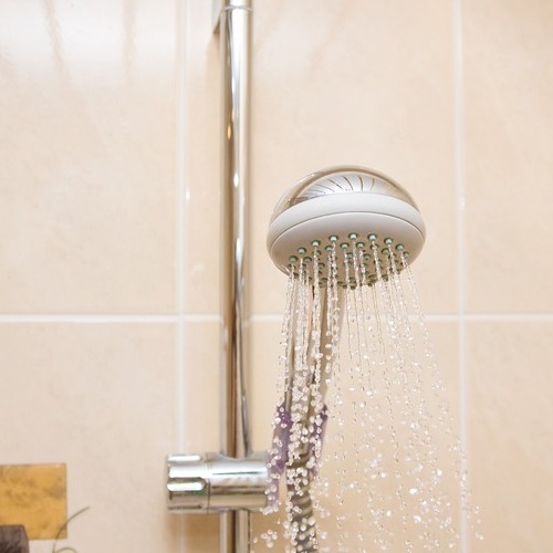 a shower head spraying water