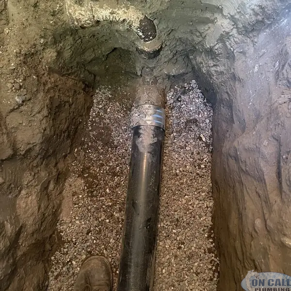 New sewer pipe laid in an open trench