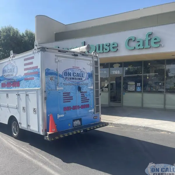 On Call Plumbing service truck at a commercial job